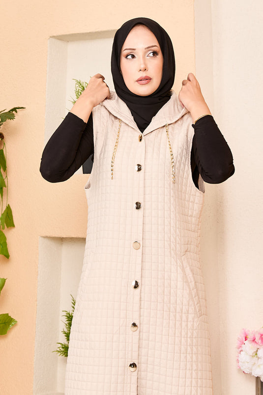 Gilet matelassé à capuche et boutons dorés beige
