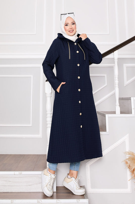 Steppmantel mit Kapuze und Taschendetails Marineblau