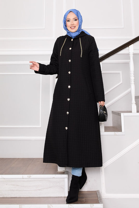 Steppmantel mit Kapuze und Taschendetails, Schwarz