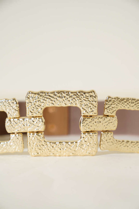 Ceinture élastique en vison avec boucle carrée et détails soignés