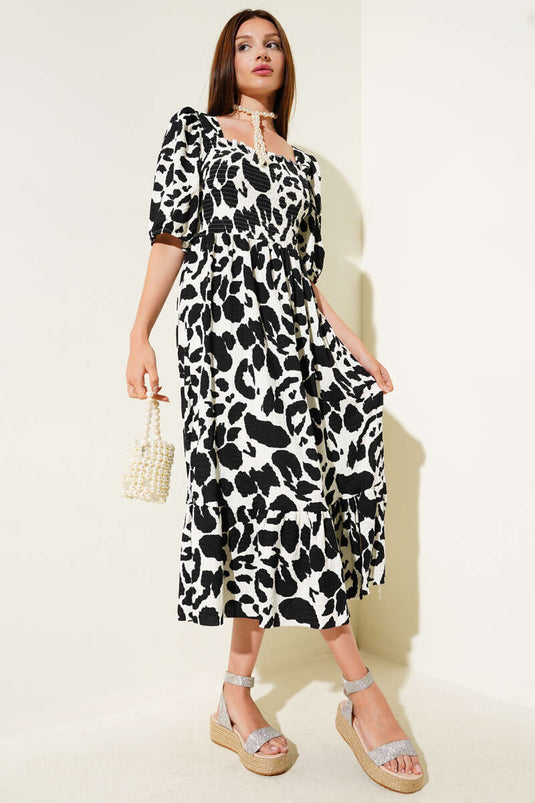 Robe midi noire à col carré en gipel