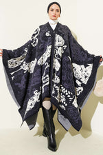 Poncho bleu marine à motifs variés