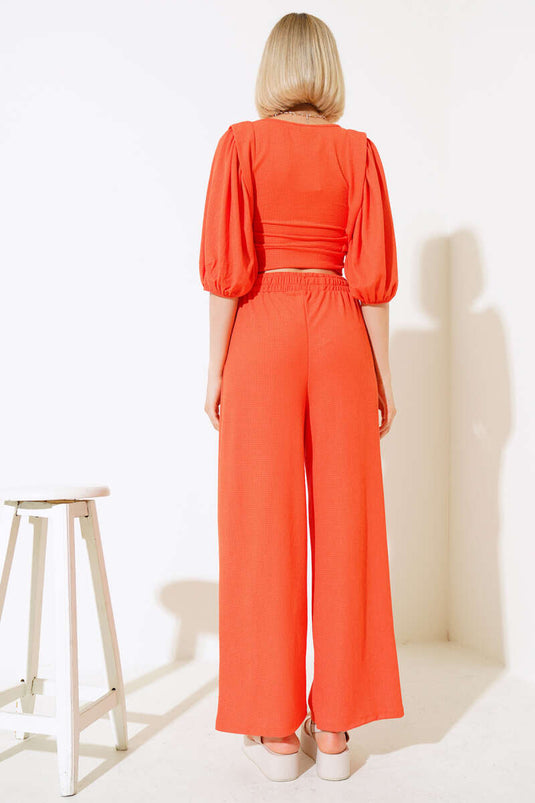 Ensemble deux pièces orange à manches pastèque