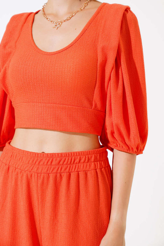 Ensemble deux pièces orange à manches pastèque