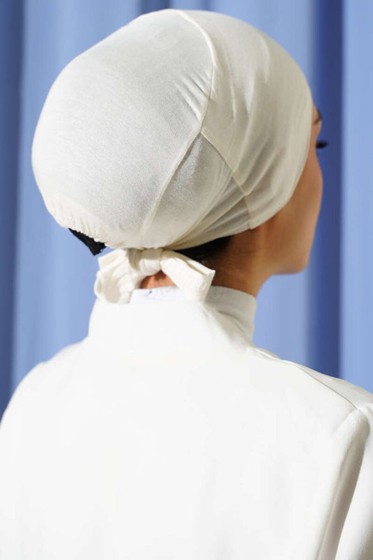 Kaymaz Silikonlu Bağlamalı Bone Ekru