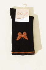 Chaussette courte pour femme avec détail papillon noir