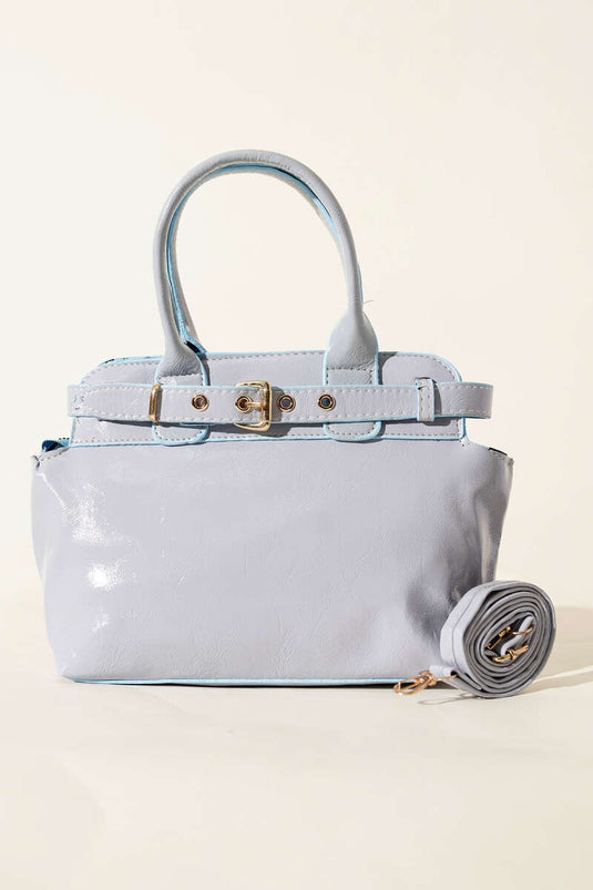 Dettaglio clip per cintura Borsa lucida blu bambino