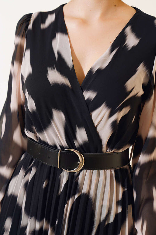 Robe en mousseline noire ceinturée