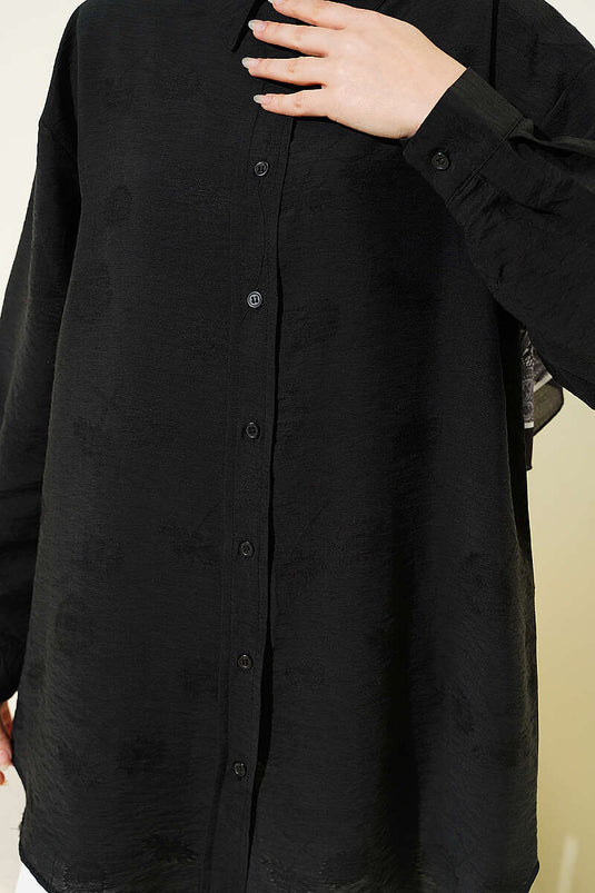 Camicia nera con motivo floreale integrato