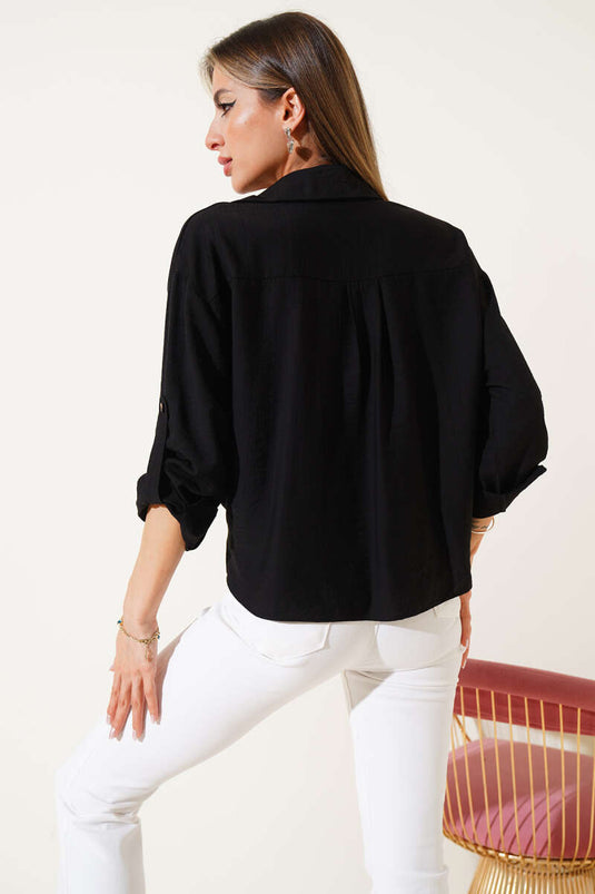 Schwarzes Hemd mit Selbstknoten