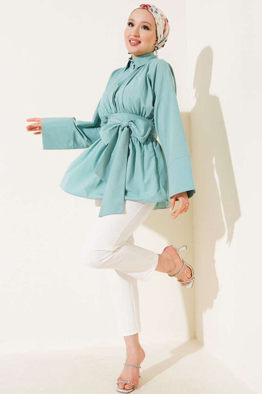 Self-belted, front-gathered tunic in mint color.