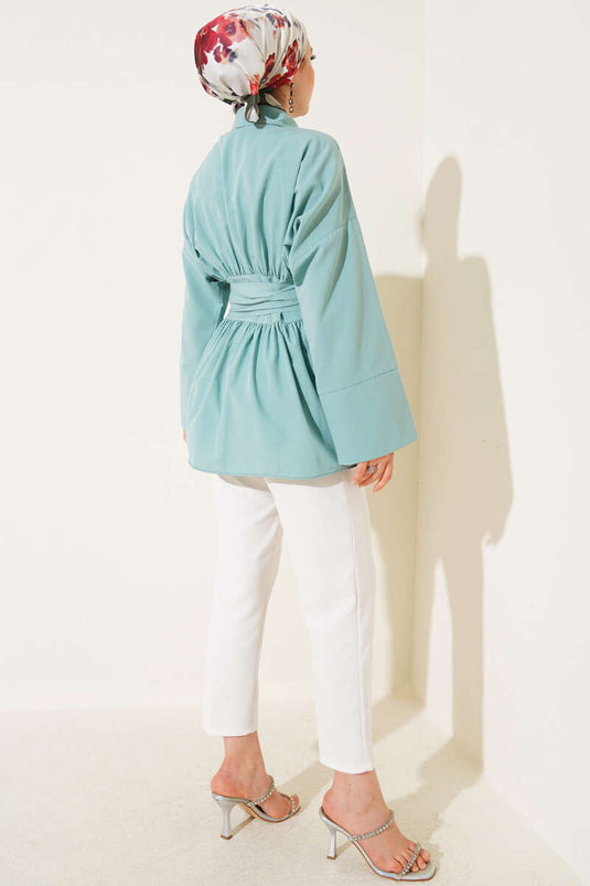 Self-belted, front-gathered tunic in mint color.