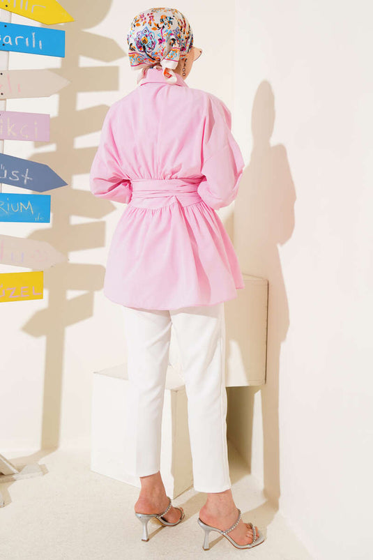 Tunique rose avec ceinture assortie et devant froncé