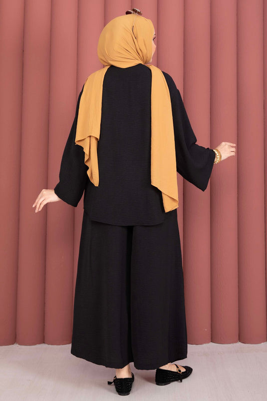 Completo estivo modest fashion con kimono a taglio ampio, nero