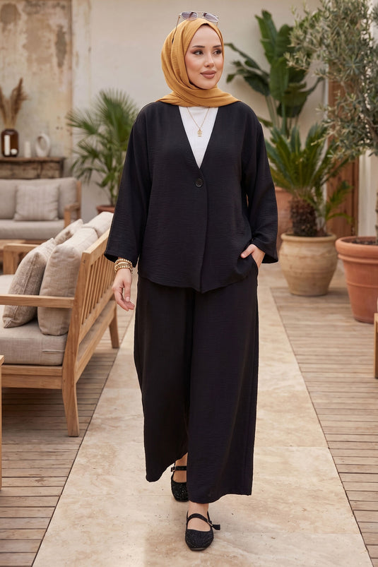 Completo estivo modest fashion con kimono a taglio ampio, nero