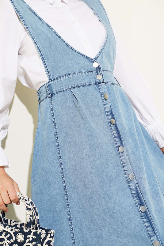 Gilet élastique à taille évasée et jean ouvert