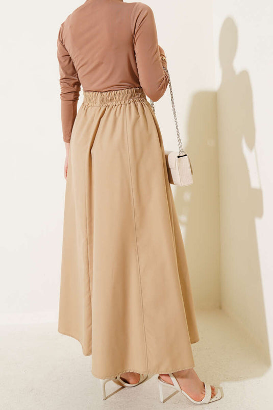 Jupe évasée couleur latte avec taille élastique et poches