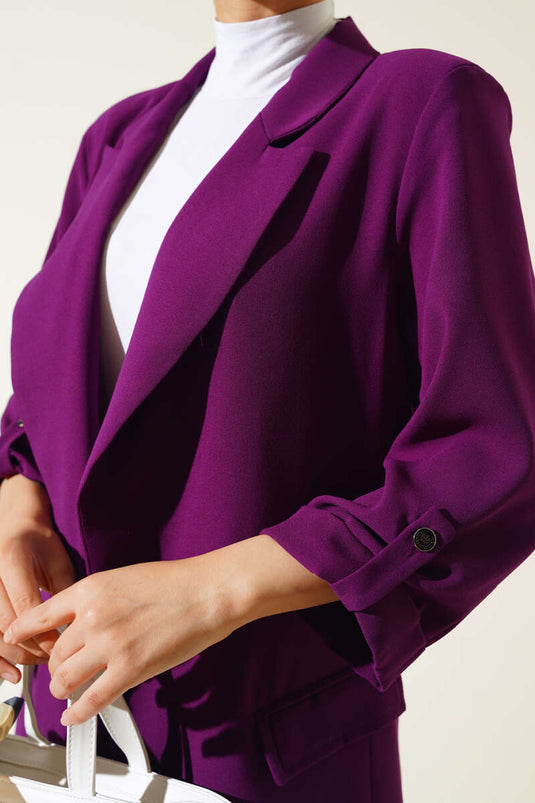 Veste détaillée à manches pliées et poche violette