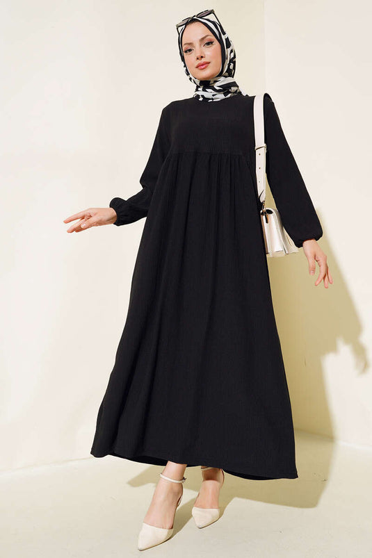 Robe en crêpe à manches élastiquées noire