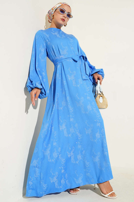 فستان أزرق منقوش بأكمام مرنة