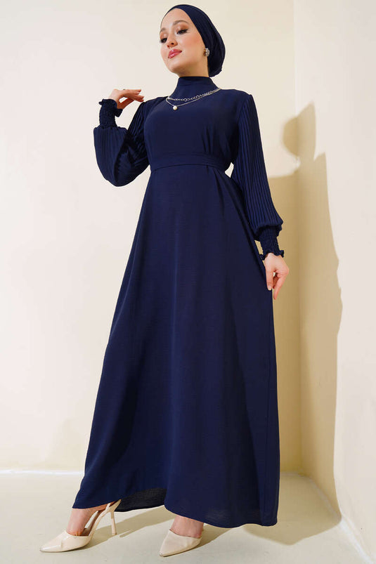 Navy Blue Dress with Ruffled Pearl Necklace