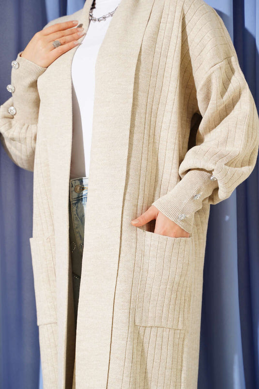 Cardigan en maille à col châle et manches boutonnées, beige