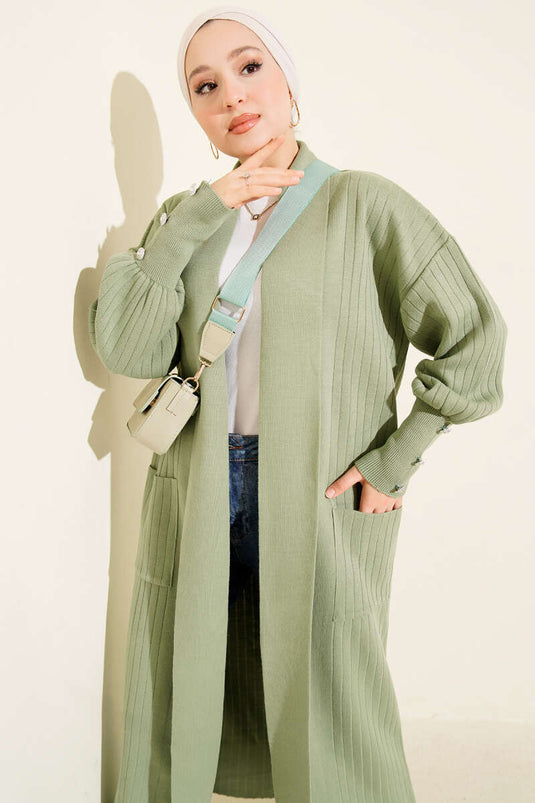 Cardigan lavorato a maglia con collo a scialle e maniche abbottonate, verde mandorla