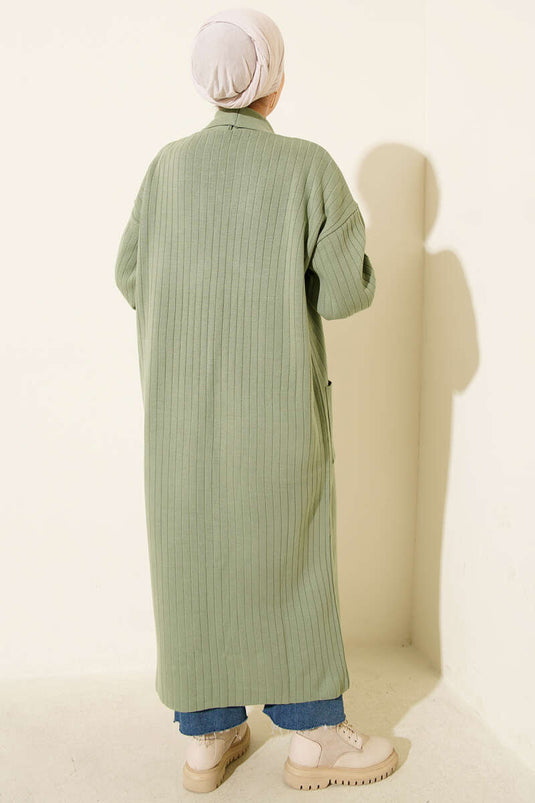 Cardigan lavorato a maglia con collo a scialle e maniche abbottonate, verde mandorla