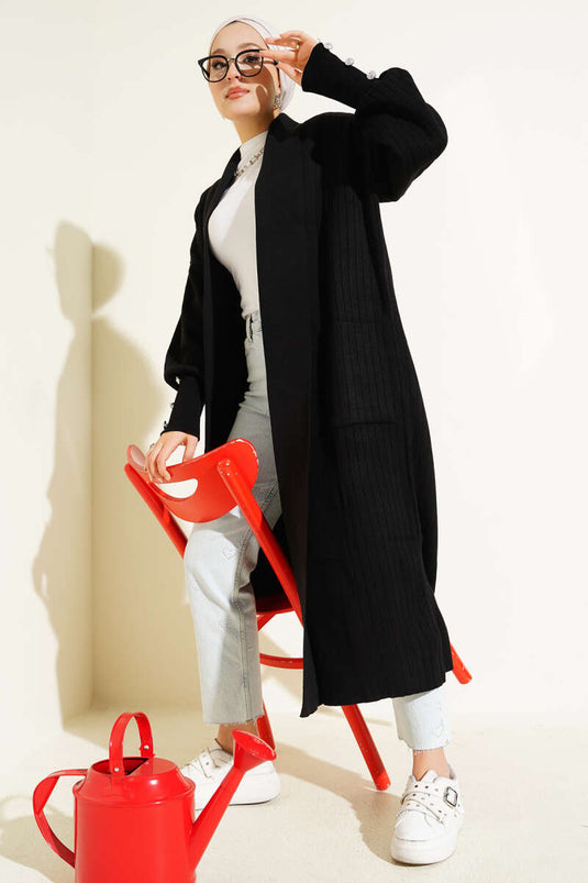 Cardigan tricoté à col châle et manches boutonnées, noir