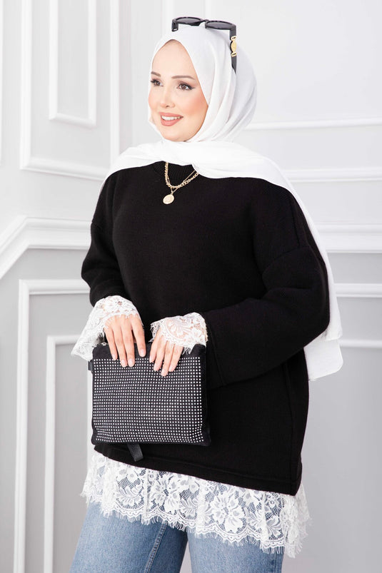 Schwarzer Strickpullover Mit Spitzenabschluss An Saum Und Bündchen