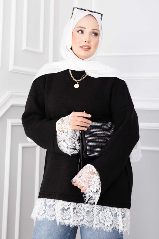 Schwarzer Strickpullover Mit Spitzenabschluss An Saum Und Bündchen