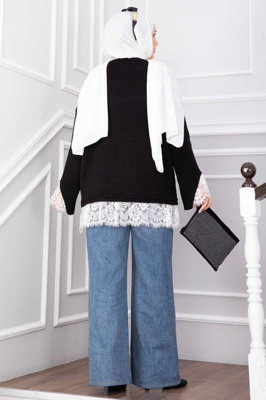 Schwarzer Strickpullover Mit Spitzenabschluss An Saum Und Bündchen