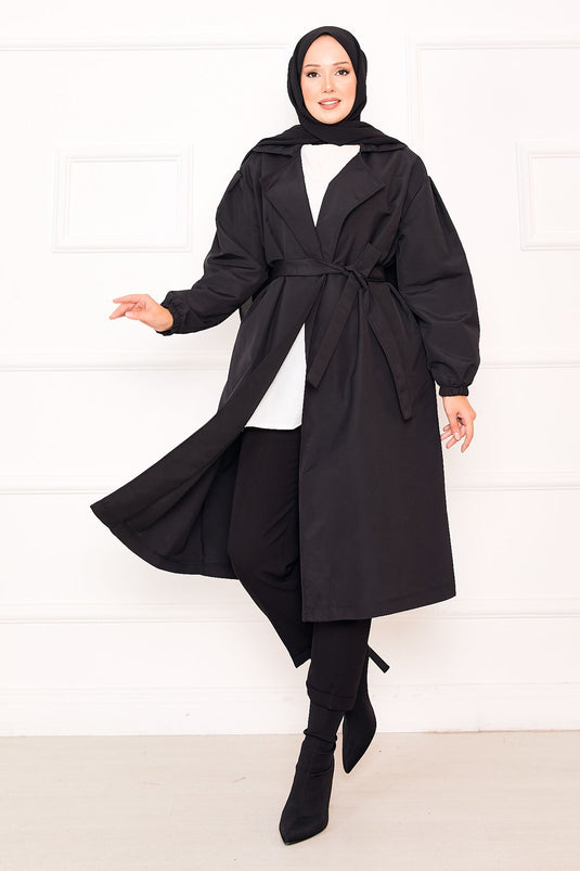 معطف ترنش أسود بأكمام مرنة وحزام قابل للإزالة