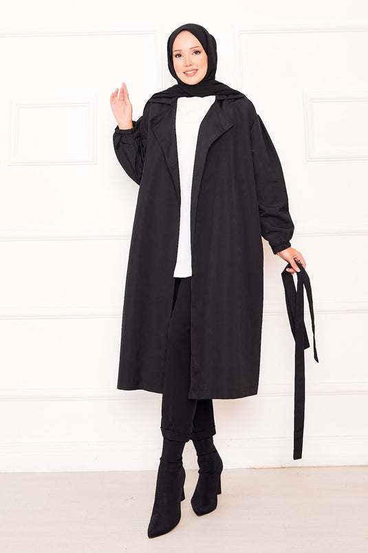 Trench-coat noir à manches élastiquées et ceinture amovible pour hijab