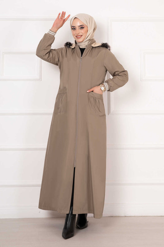 Manteau en vison avec manches côtelées et intérieur en fourrure