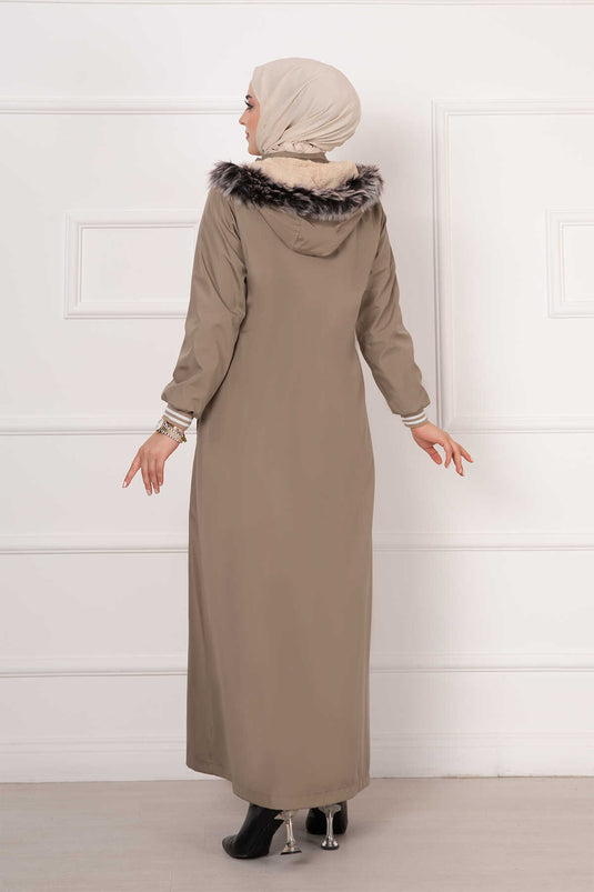 Manteau en vison avec manches côtelées et intérieur en fourrure