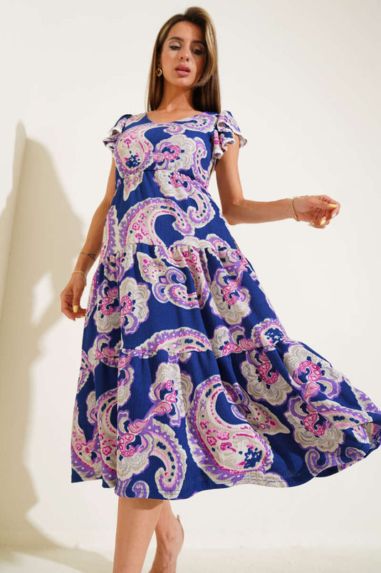 Marineblaues Kleid mit Rüschenärmeln und Muster