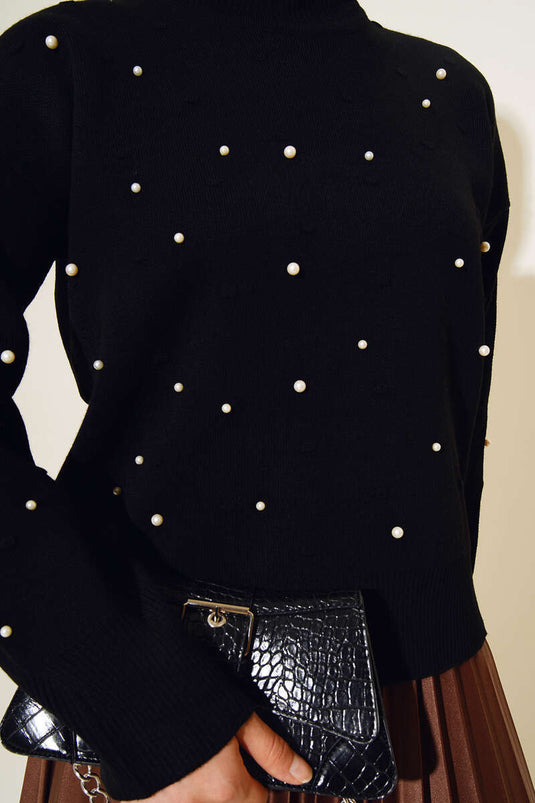 Pull en tricot avec perles sur les manches et le devant, noir