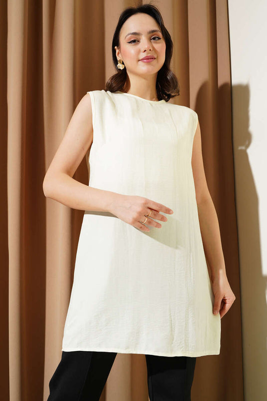 ملابس داخلية طويلة بدون أكمام ورقبة دائرية بلون البيج الفاتح