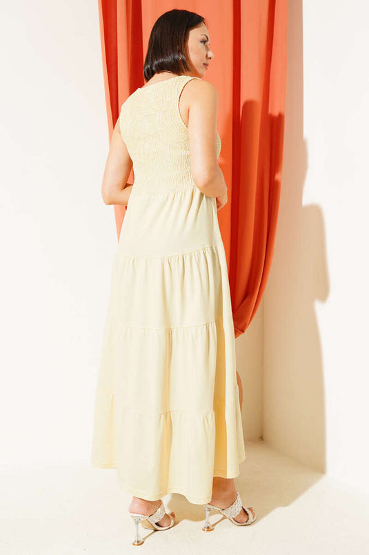 فستان جيبيل أصفر بدون أكمام متعدد الطبقات