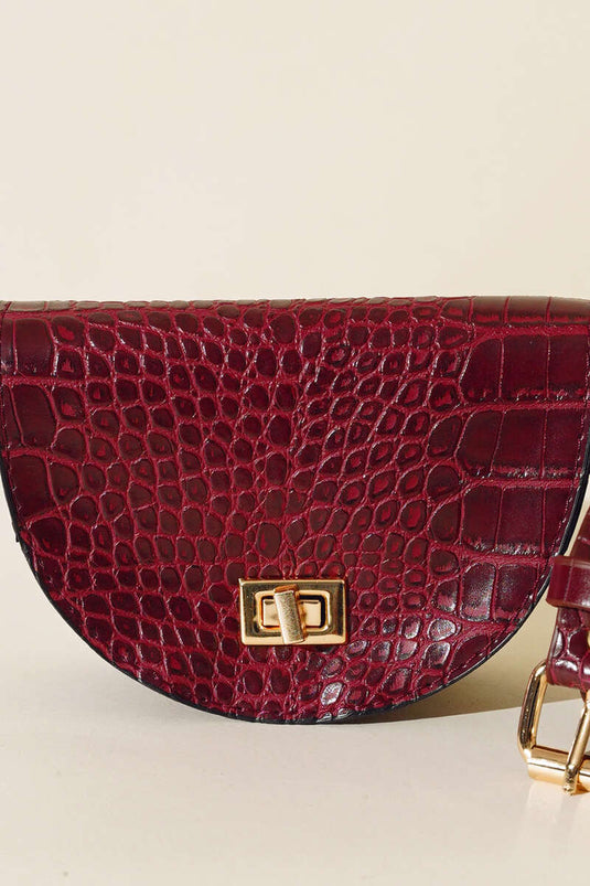 Ovale Gürteltasche aus Krokodilleder, bordeauxrot