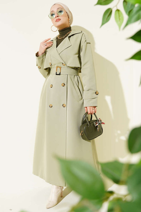 Trench-coat croisé avec cape et ceinture, vert clair.
