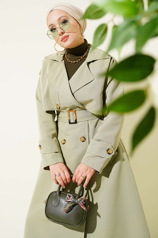 Trench-coat croisé avec cape et ceinture, vert clair.
