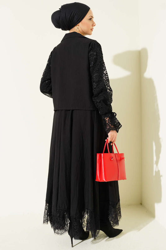 Ensemble deux pièces noir avec jupe à dentelle et col croisé