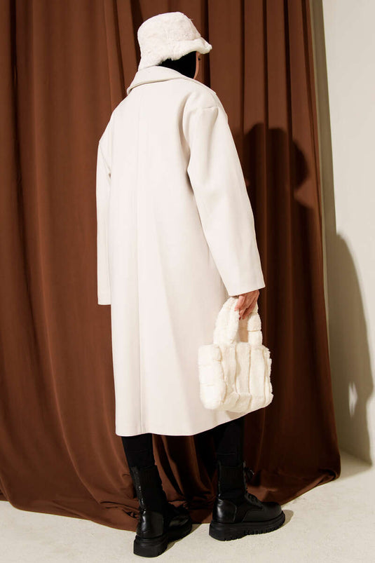 Manteau croisé en cachemire à deux boutons avec détails en pierre