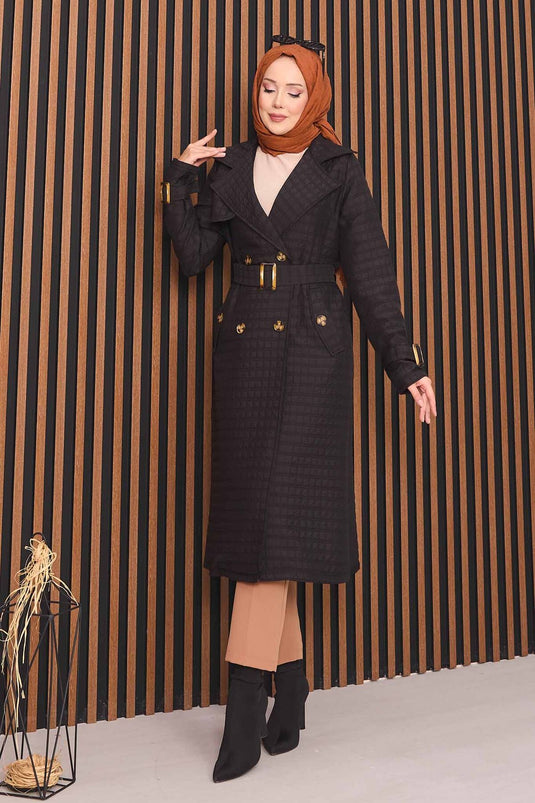 Trench-coat matelassé noir à double boutonnage et ceinture, avec hijab intégré