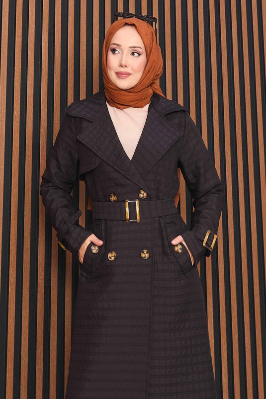 Trench-coat matelassé noir à double boutonnage et ceinture, avec hijab intégré
