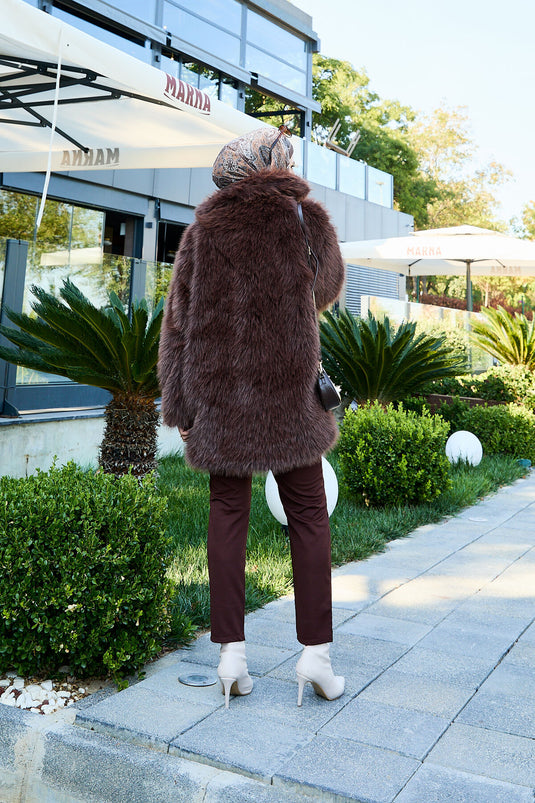 Manteau en fourrure à double boutonnage marron