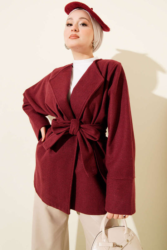Veste croisée en cachemire ceinturée, bordeaux.