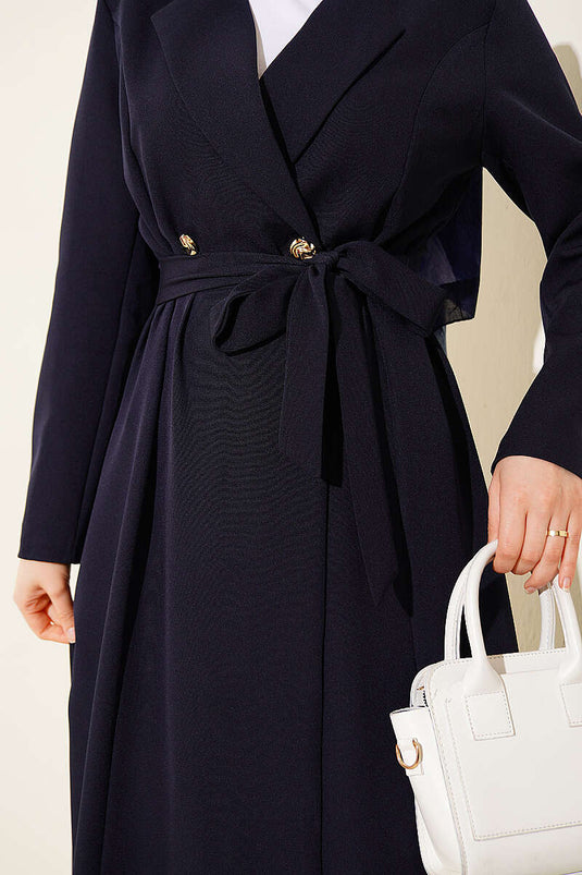 Manteau long croisé ceinturé bleu marine